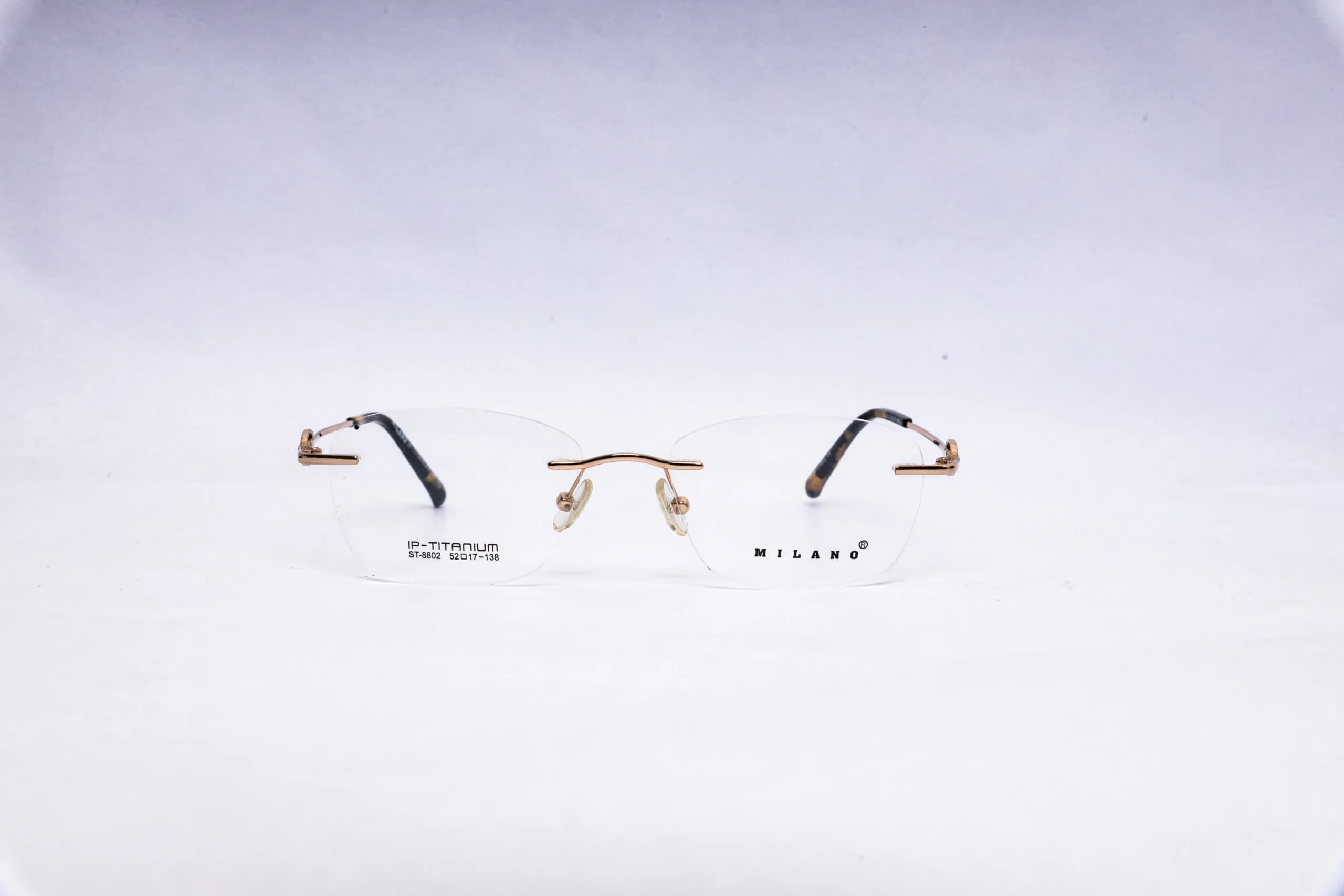 MILANO Rimless Oval Blue Titanium Eyeglasses - front view