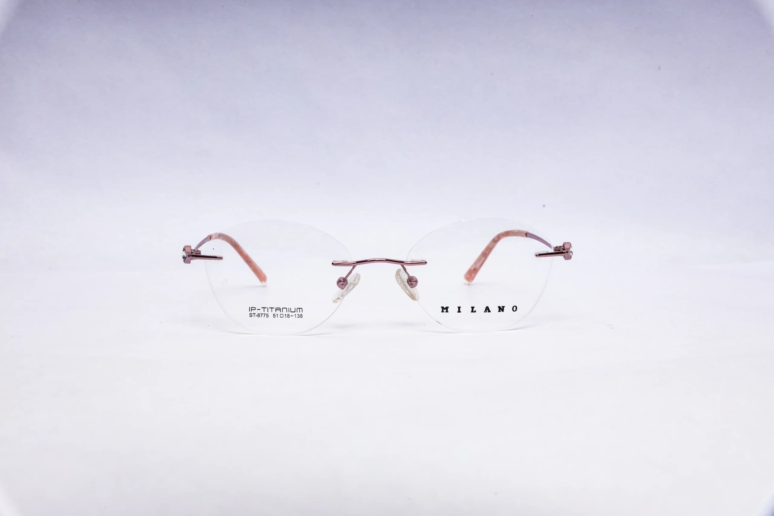 MILANO Rimless Round Golden Titanium Eyeglasses - front view